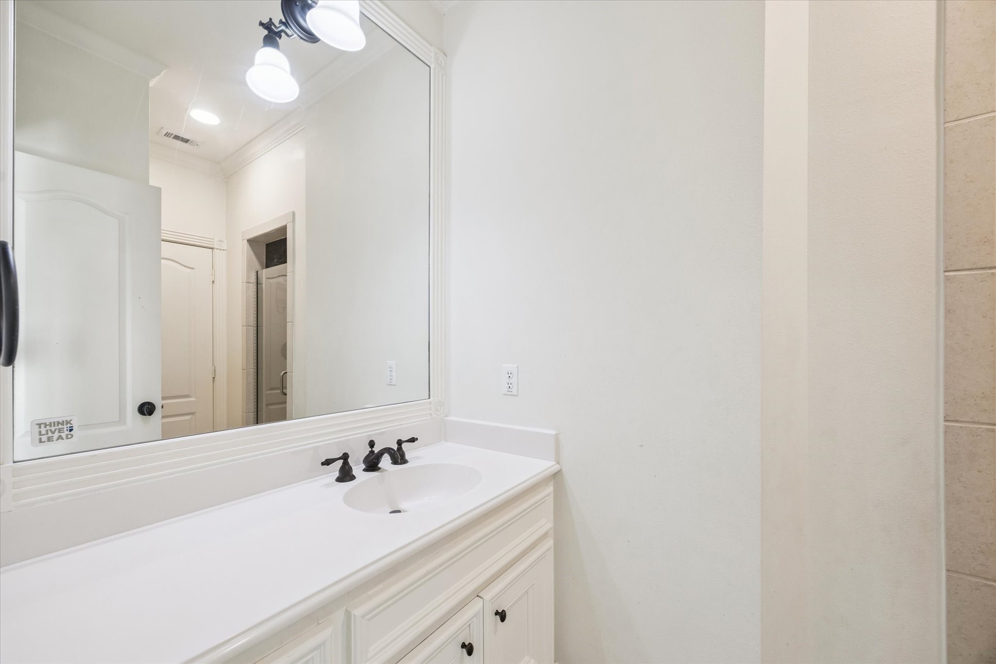 3818 Case Street West University Place, TX 77005 - Photo 23 of 29 a bathroom with a sink and a mirror