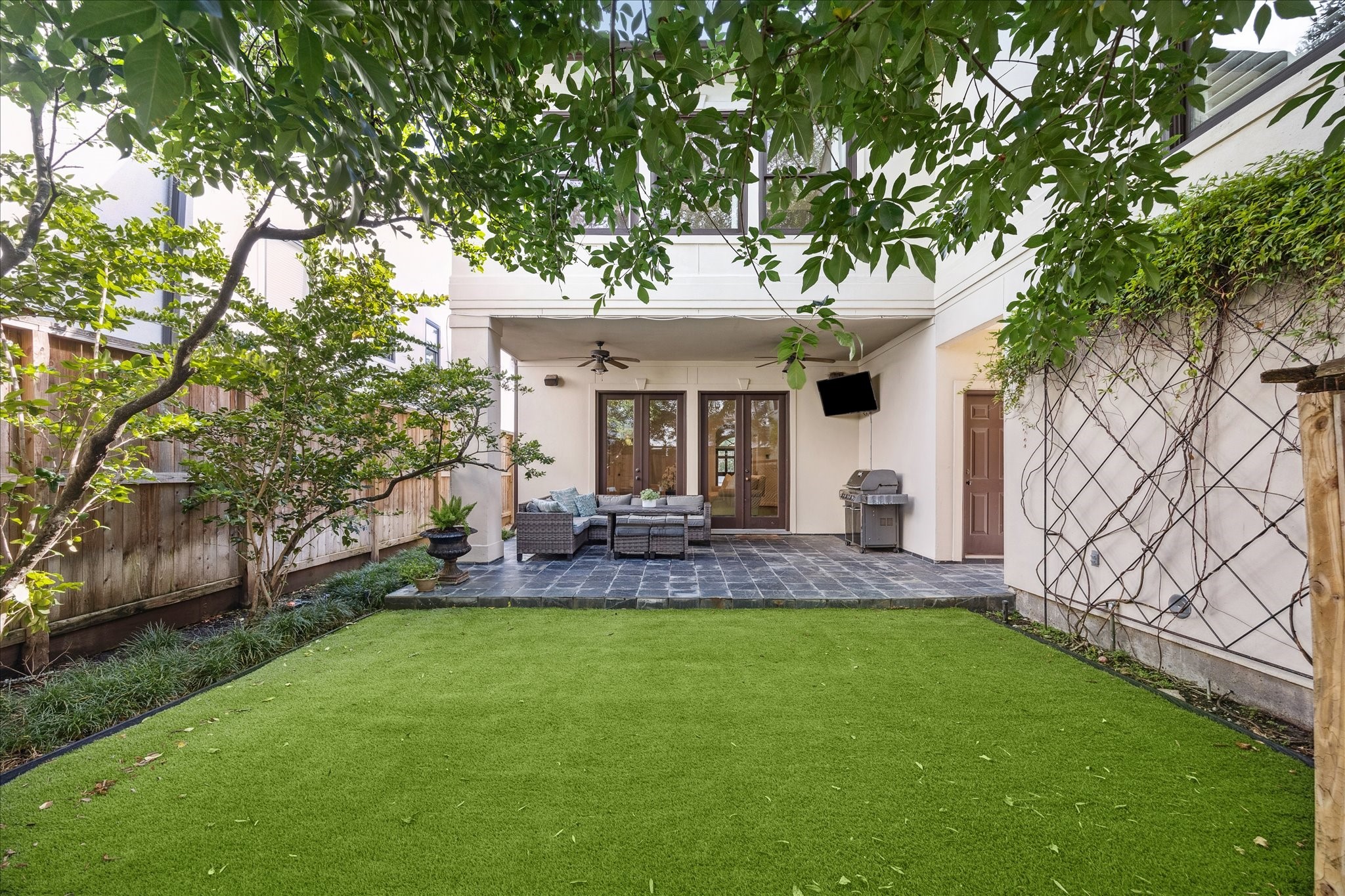 3818 Case Street West University Place, TX 77005 - Photo 29 of 29 a view of a house with a yard and sitting area