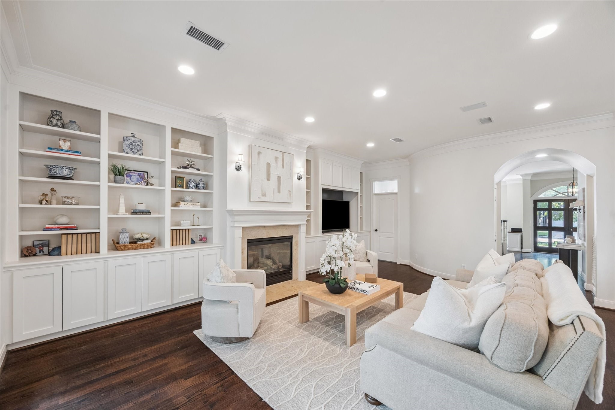3818 Case Street West University Place, TX 77005 - Photo 8 of 29 a living room with furniture and a fireplace