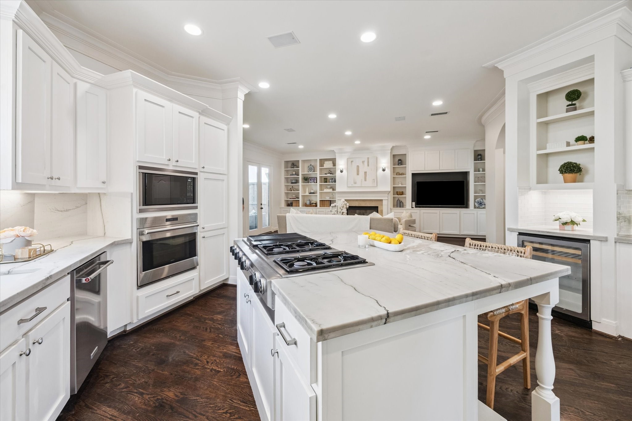 3818 Case Street West University Place, TX 77005 - Photo 10 of 29 a kitchen with stainless steel appliances kitchen island granite countertop a stove and a sink