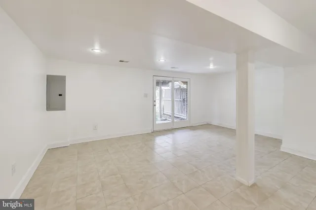 an empty room with windows