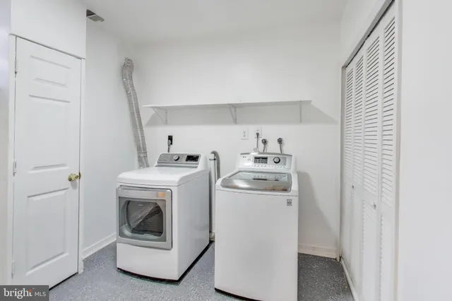 a front view of a house with garage