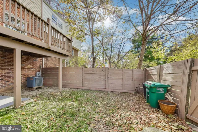 a view of a building with car parked