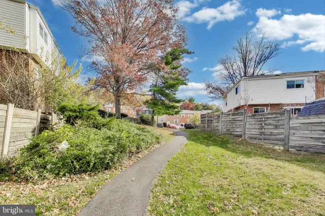a view of a city street with cars
