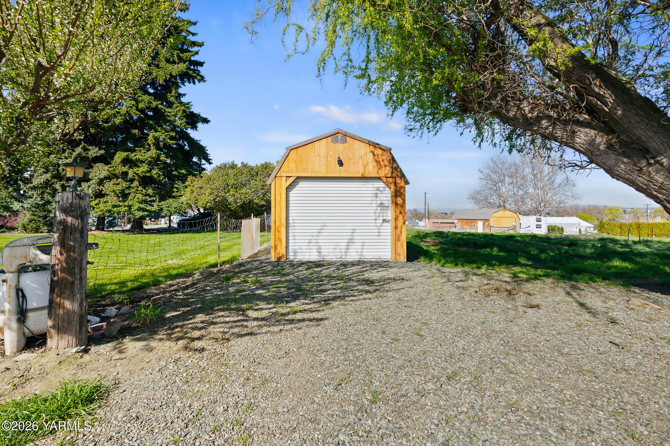 505 Schooley Road Zillah, WA 98953 - Photo 24 of 39 a view of a tiny house with a yard