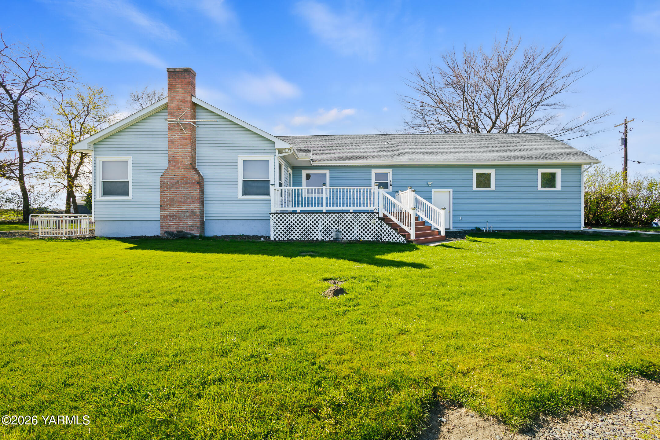 505 Schooley Road Zillah, WA 98953 - Photo 25 of 39 a front view of house with yard and green space