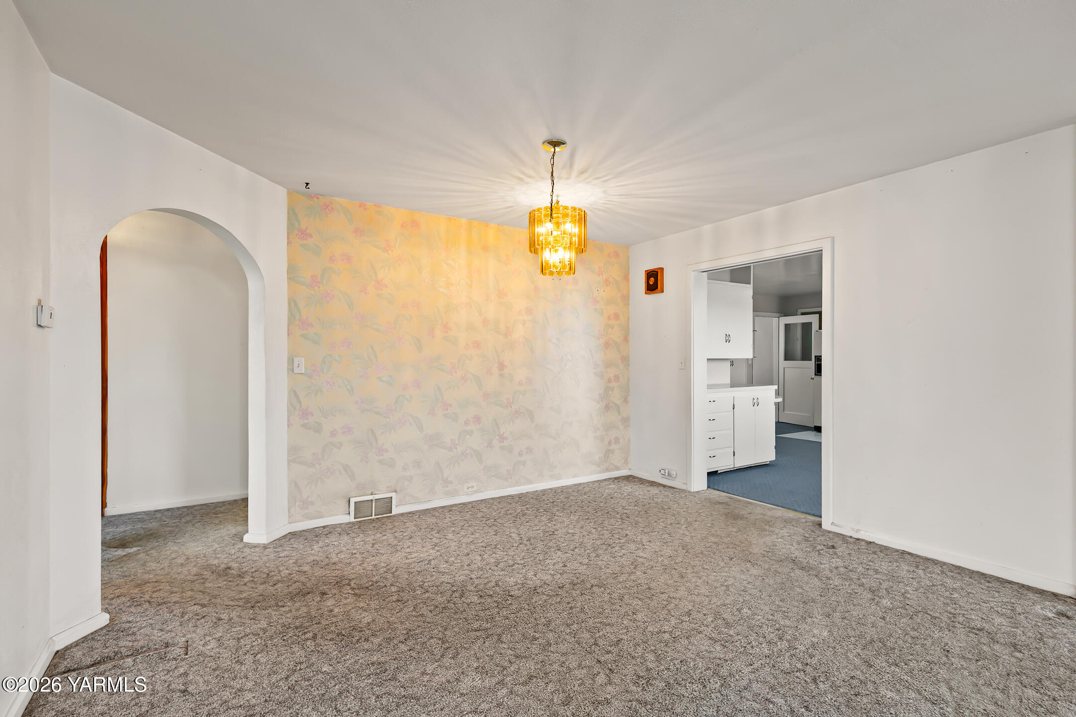 505 Schooley Road Zillah, WA 98953 - Photo 6 of 39 a view of a room with a stylish ceiling fan and entryway