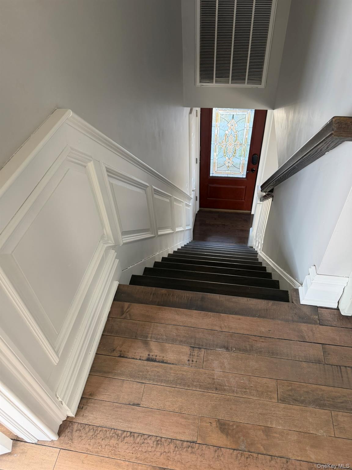 16 Cape Road Amityville, NY 11701 - Photo 21 of 27 Stairway with wood-type flooring
