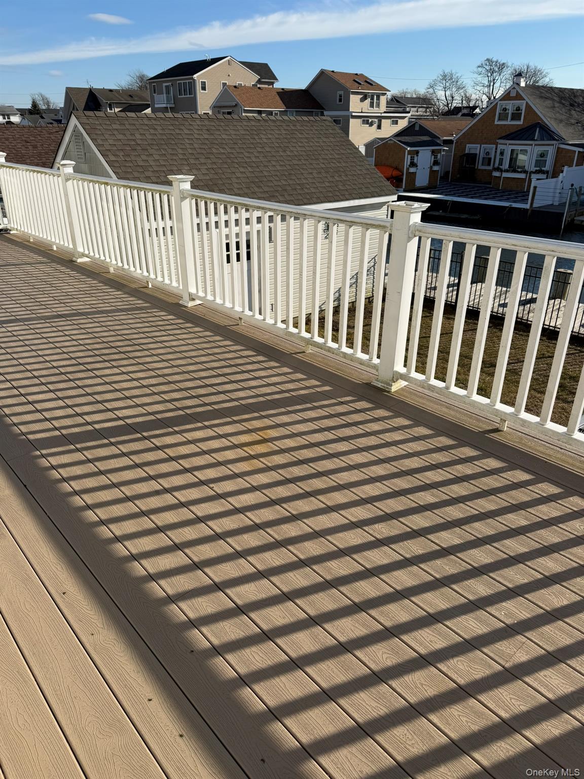 16 Cape Road Amityville, NY 11701 - Photo 25 of 27 Deck with a residential view