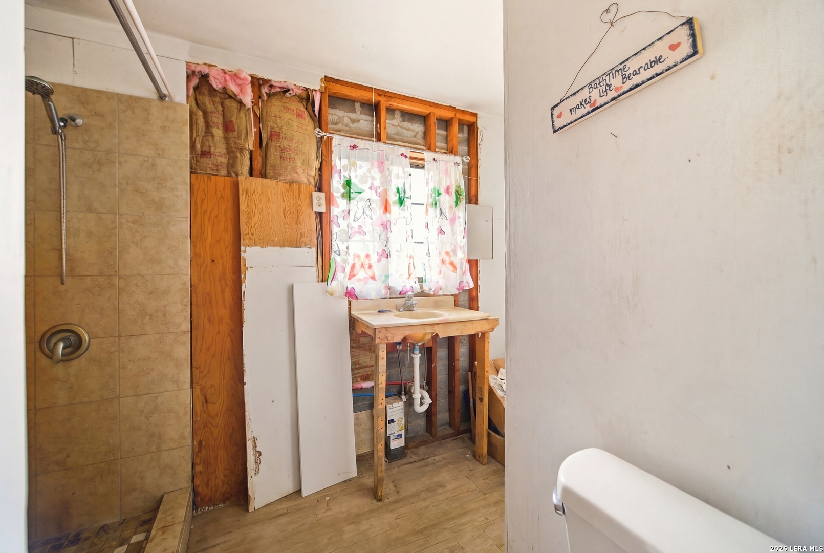 4988 South Loop 1604 East Elmendorf, TX 78112 - Photo 19 of 31 a bathroom with a shower and a toilet