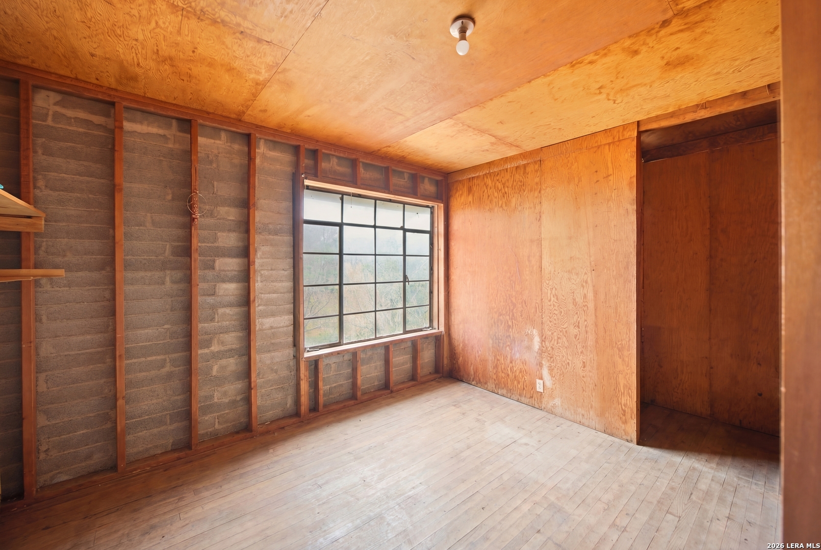 4988 South Loop 1604 East Elmendorf, TX 78112 - Photo 21 of 31 an empty room with windows
