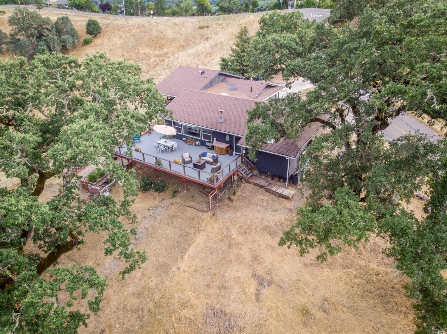 701 Riverside Drive Ukiah, CA 95482 - Photo 1 of 1 an aerial view of a house with a yard basket ball court and outdoor seating