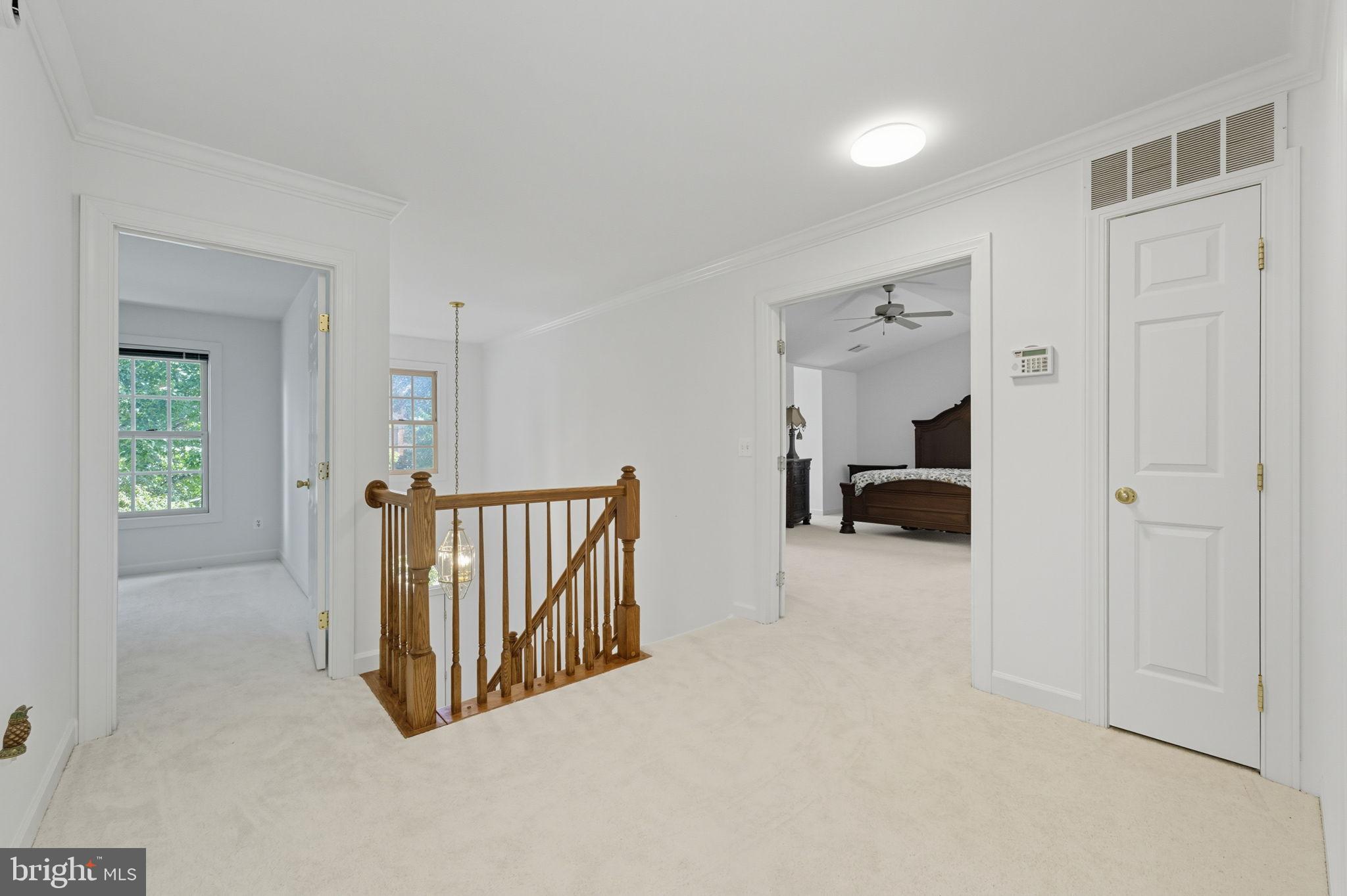 20765 Bank Way Sterling, VA 20165 - Photo 25 of 61 staircase with loft space in upper-level