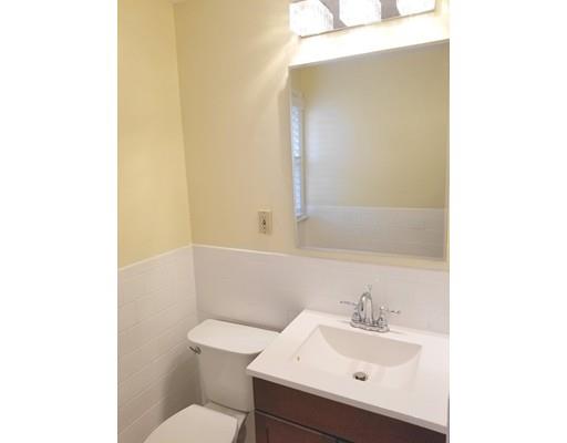 34 Spallus Road Stoughton, MA 02072 - Photo 13 of 30 a bathroom with a sink and a toilet