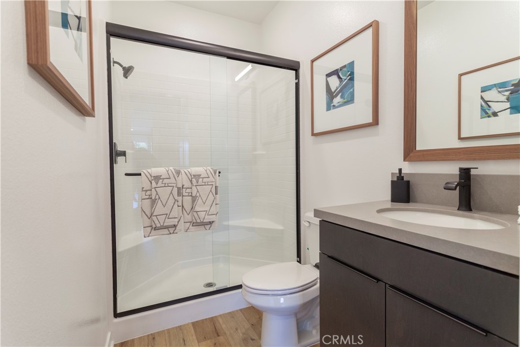 668 Panorama Lane La Puente, CA 91744 - Photo 8 of 13 a bathroom with a granite countertop sink mirror vanity and toilet