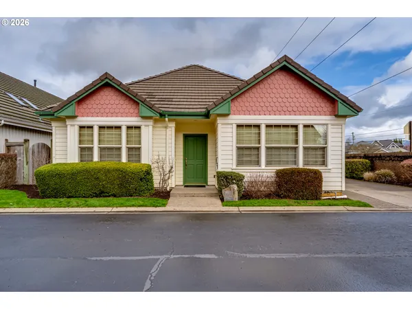 a house view with a garden space
