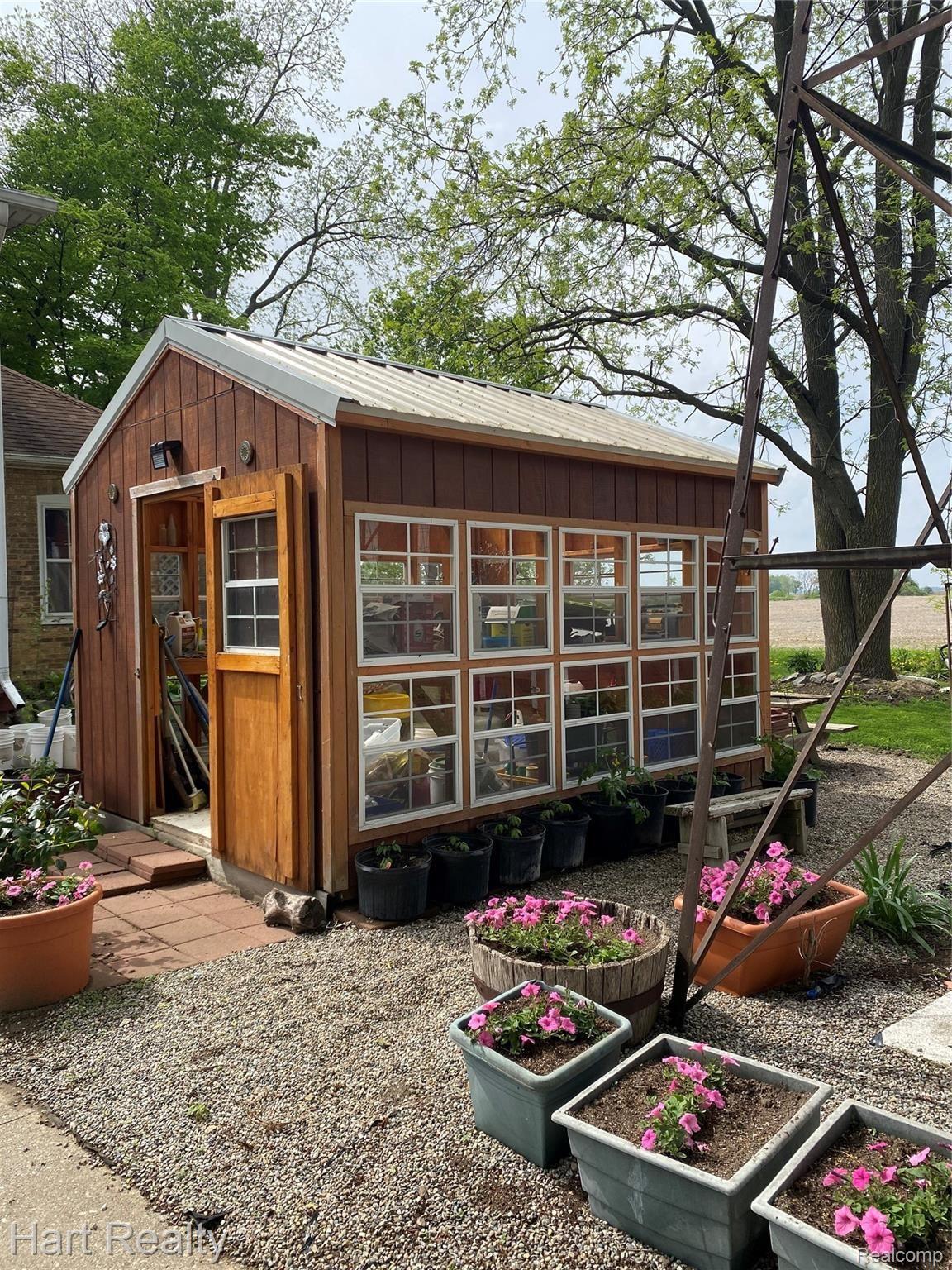 5910 Walker Road Marlette, MI 48453 - Photo 5 of 51 Start your seeds in this greenhouse