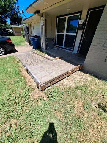 a view of a backyard of a house