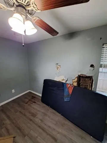 a wooden bench sitting in a room