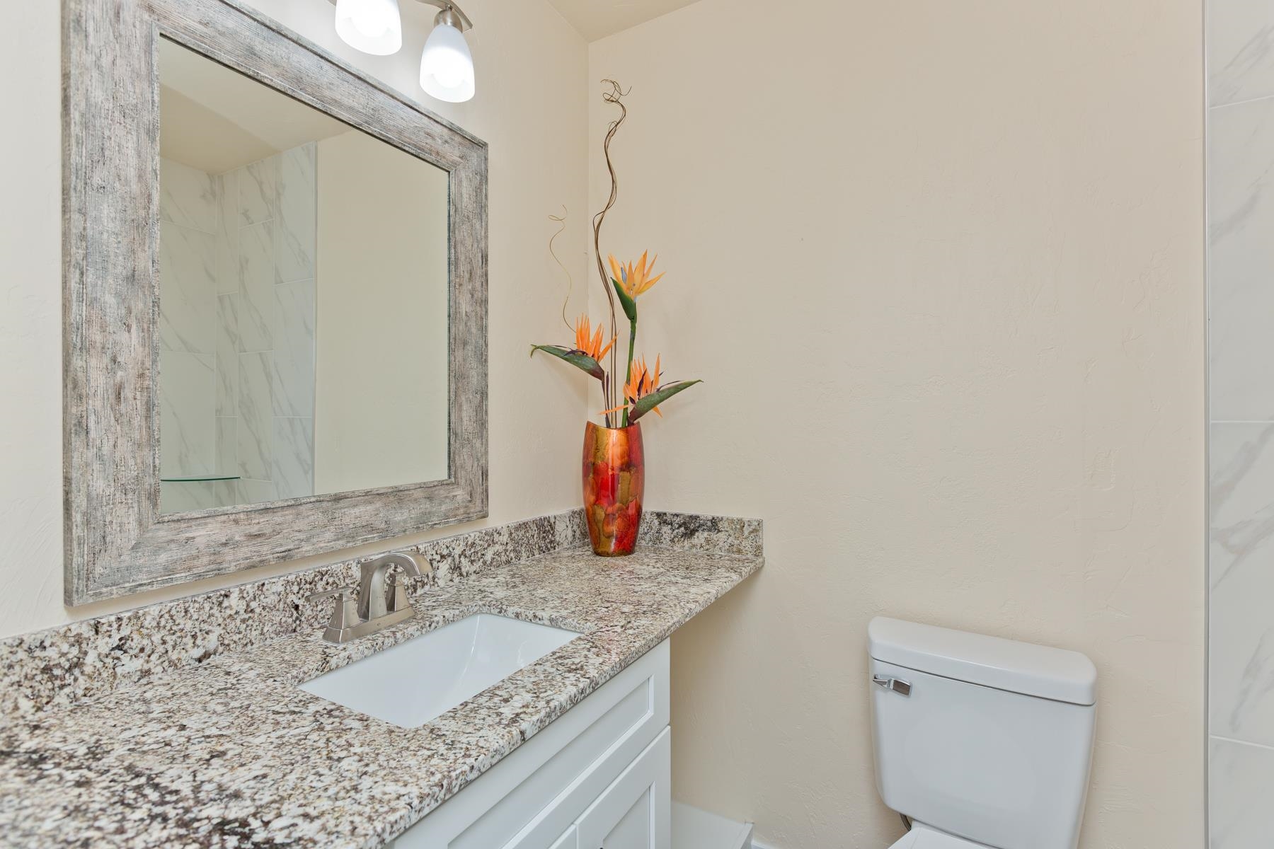 575-28 28 1/2 Road, Unit 44 Grand Junction, CO 81501 - Photo 19 of 39 a bathroom with a granite countertop sink and a mirror