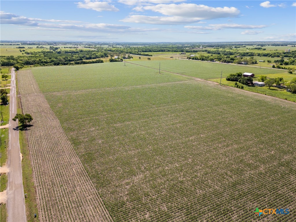 a view of an ocean and city