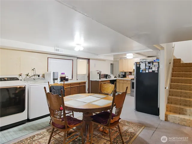 a view of a dining room with furniture