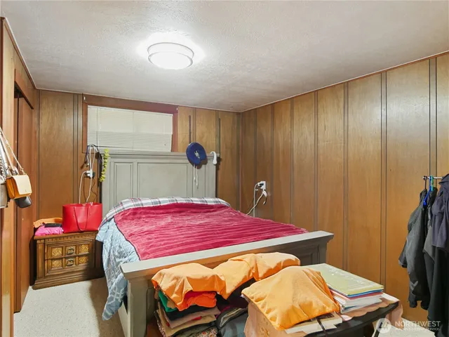 a bathroom with a sink a toilet and a window