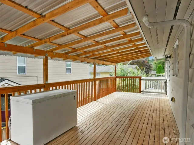 a bedroom with furniture and a lamp