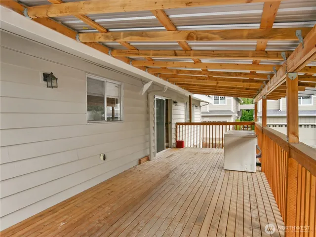 a view of a room with a large window