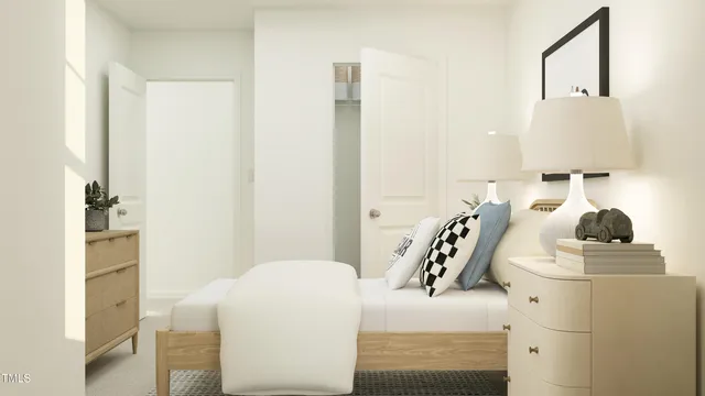 a bedroom with furniture and a mirror