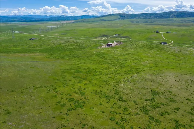 a view of a golf course with a garden