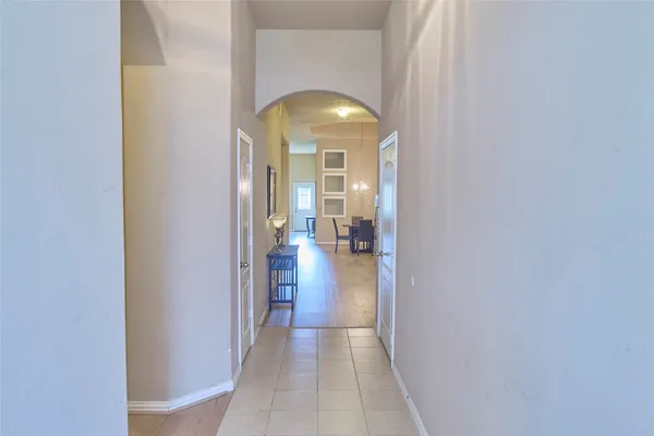 a view of a bathroom from a hallway