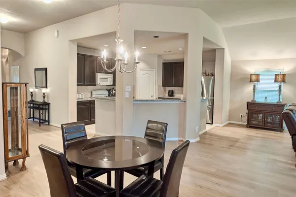 a view of a dining room with furniture