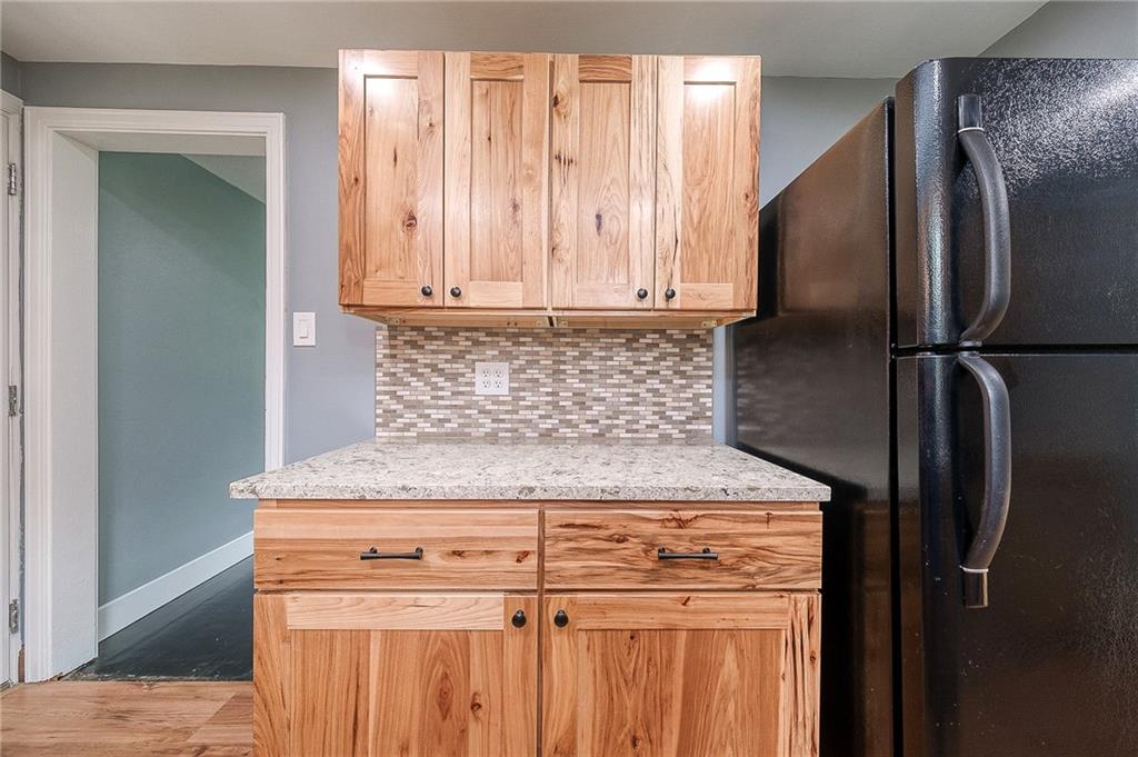 1015 McNeilly Road Pittsburgh, PA 15226 - Photo 12 of 29 a close view of a refrigerator a sink and dishwasher