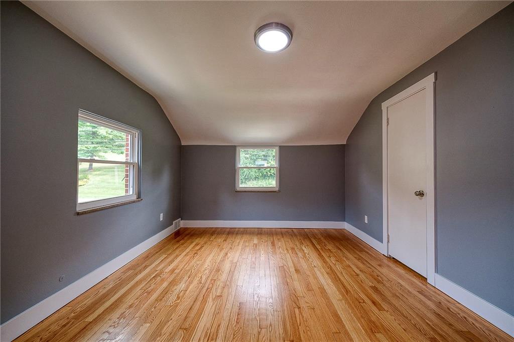 1015 McNeilly Road Pittsburgh, PA 15226 - Photo 14 of 29 an empty room with wooden floor and windows