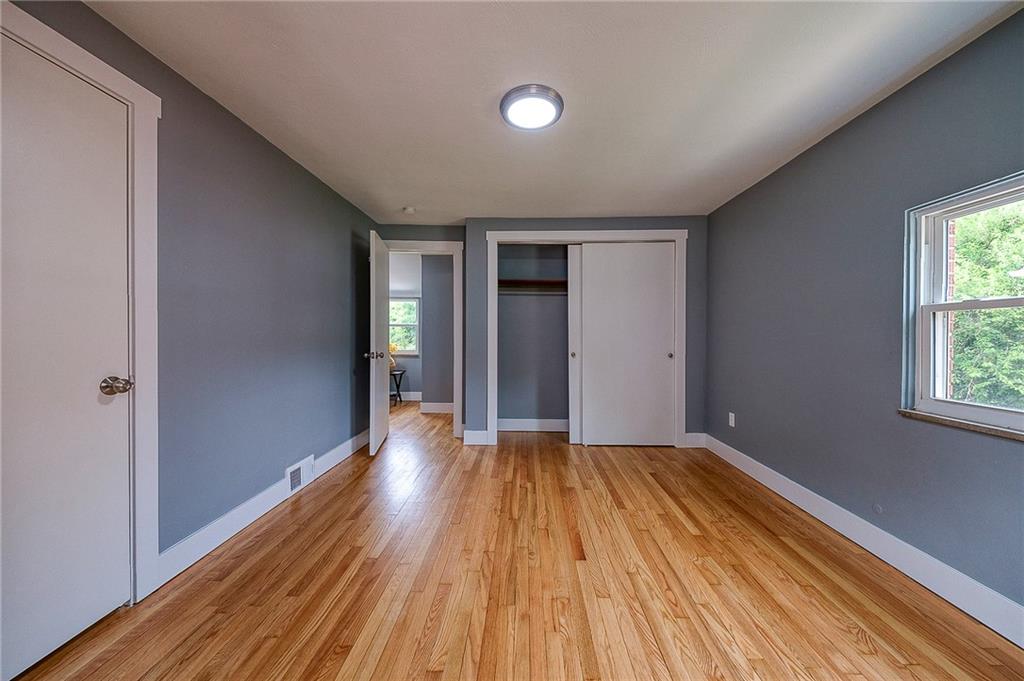 1015 McNeilly Road Pittsburgh, PA 15226 - Photo 16 of 29 a view of a big room with wooden floor and windows