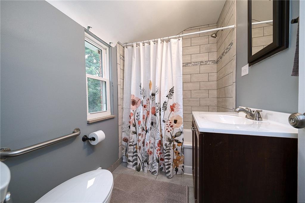 1015 McNeilly Road Pittsburgh, PA 15226 - Photo 21 of 29 a bathroom with a sink toilet and shower