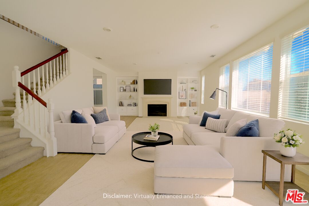 13233 Stanton Drive Rancho Cucamonga, CA 91739 - Photo 1 of 39 a living room with furniture a flat screen tv and a large window