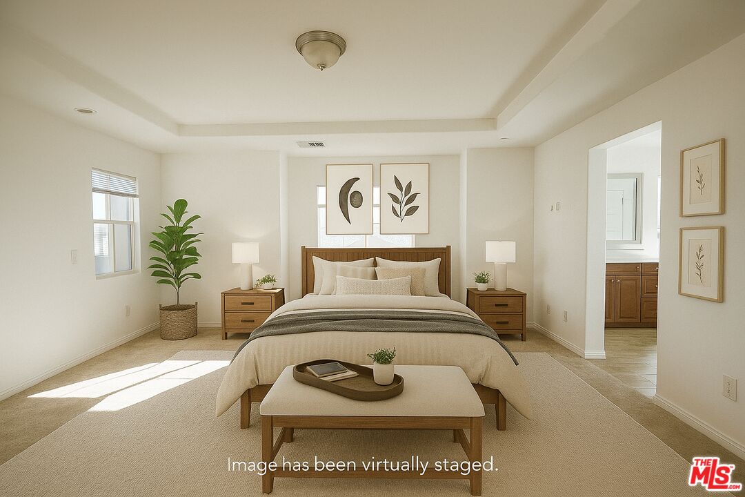 13233 Stanton Drive Rancho Cucamonga, CA 91739 - Photo 21 of 39 a living room with furniture and a potted plant