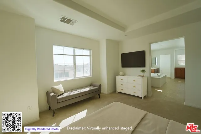 a living room with a couch and a table