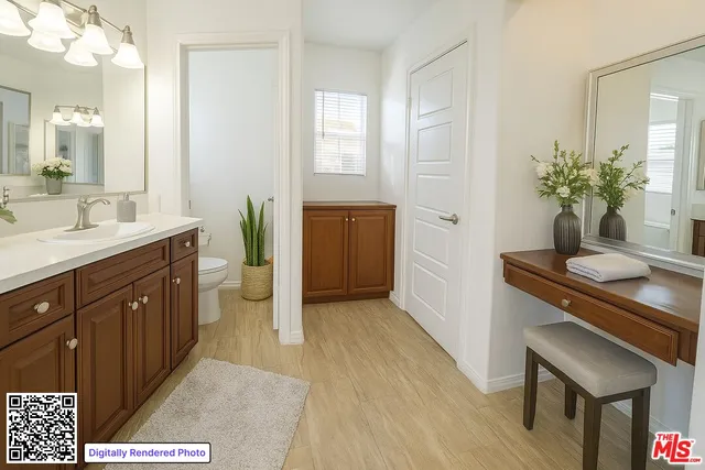 a bedroom with a bed and a couch