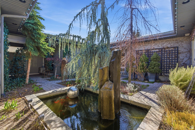 145 Carnesecca Court Mapleton, UT 84664 - Photo 62 of 109 Atrium with a patio and pond