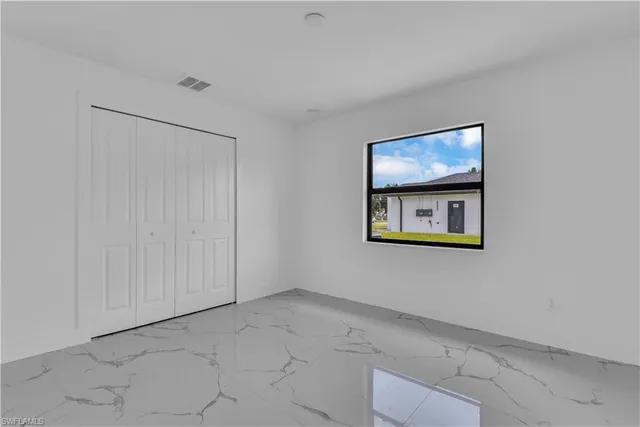 a view of a garden with an outdoor space