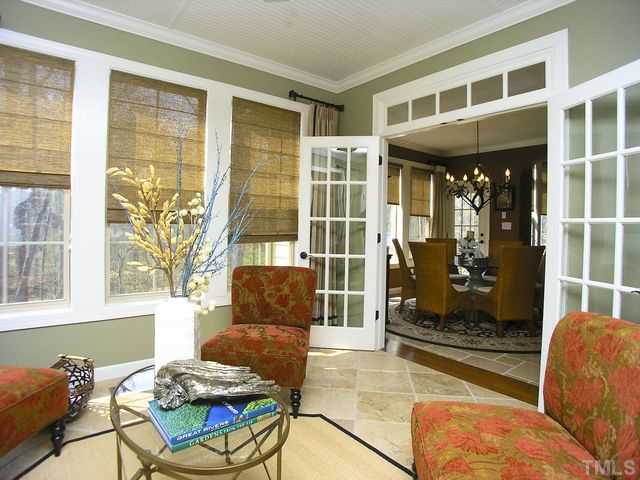 421 Rensford Place Cary, NC 27513 - Photo 14 of 25 a living room with furniture and a window