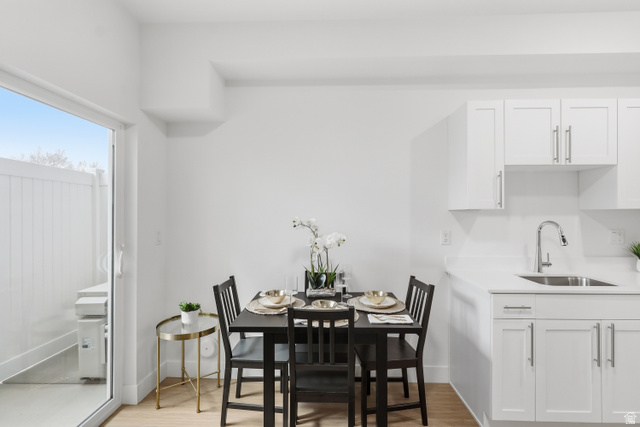 2085 North Main Street, Unit 107 Sunset, UT 84015 - Photo 8 of 21 Dining space with light wood finished floors and baseboards