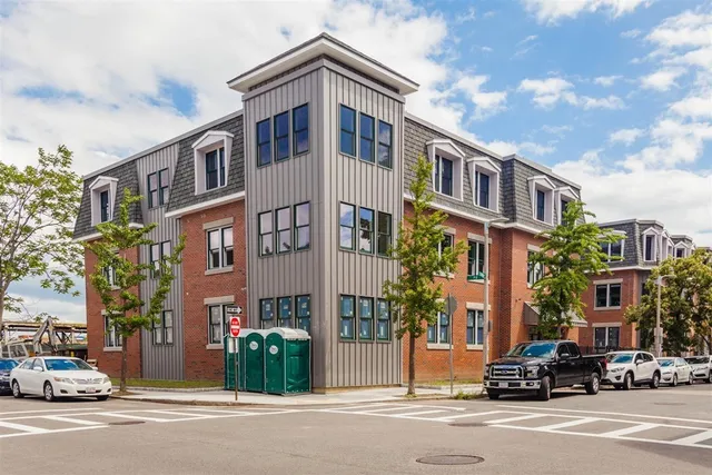 a front view of a building and a street