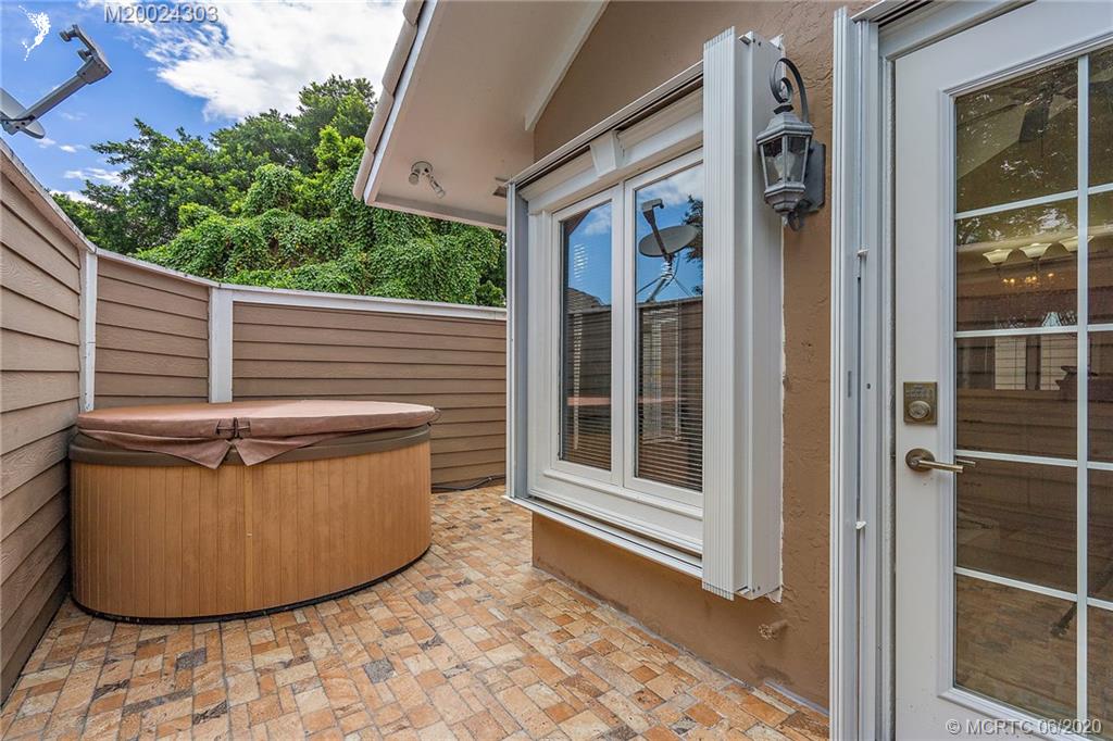 46 North River Road Sewall's Point, FL 34996 - Photo 41 of 61 Private patio with hot tub off main bathroom.