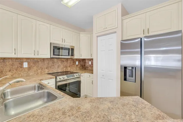 $420,000 | 10705 Santa Monica Place, Tamarac, FL 33321