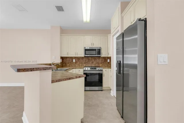 $420,000 | 10705 Santa Monica Place, Tamarac, FL 33321