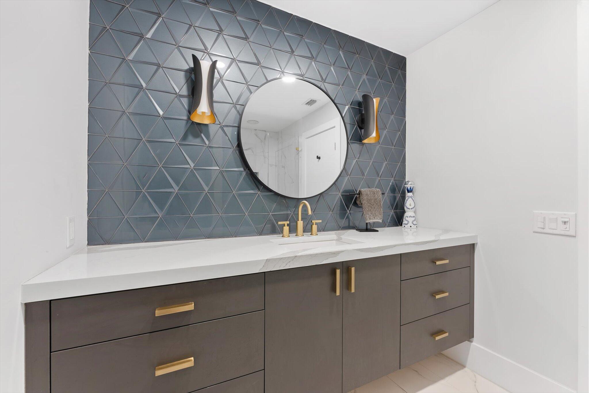 4429 Woodfield Boulevard Boca Raton, FL 33434 - Photo 34 of 61 a bathroom with a sink mirror and vanity